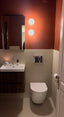 Islington terracota coloured bathroom, mid-century style renovation