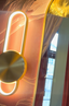FAENA oval brass wall light